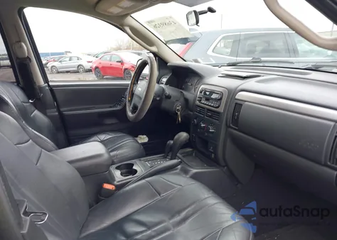 2004 Jeep Grand Cherokee Laredo from USA, damaged, VIN 1J4GW48N74C137150